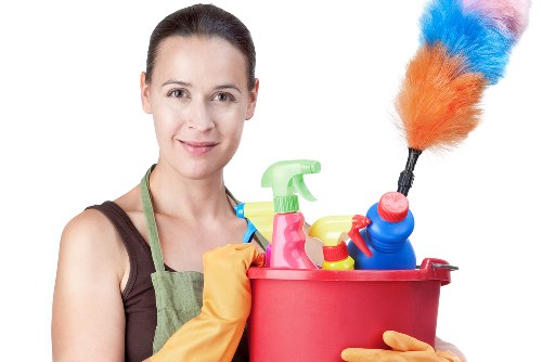 Professional upholstery cleaning of a sofa in a living room