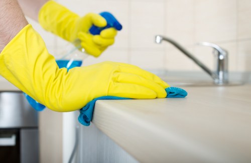 Professional office cleaning tools and supplies arranged for workplace cleaning